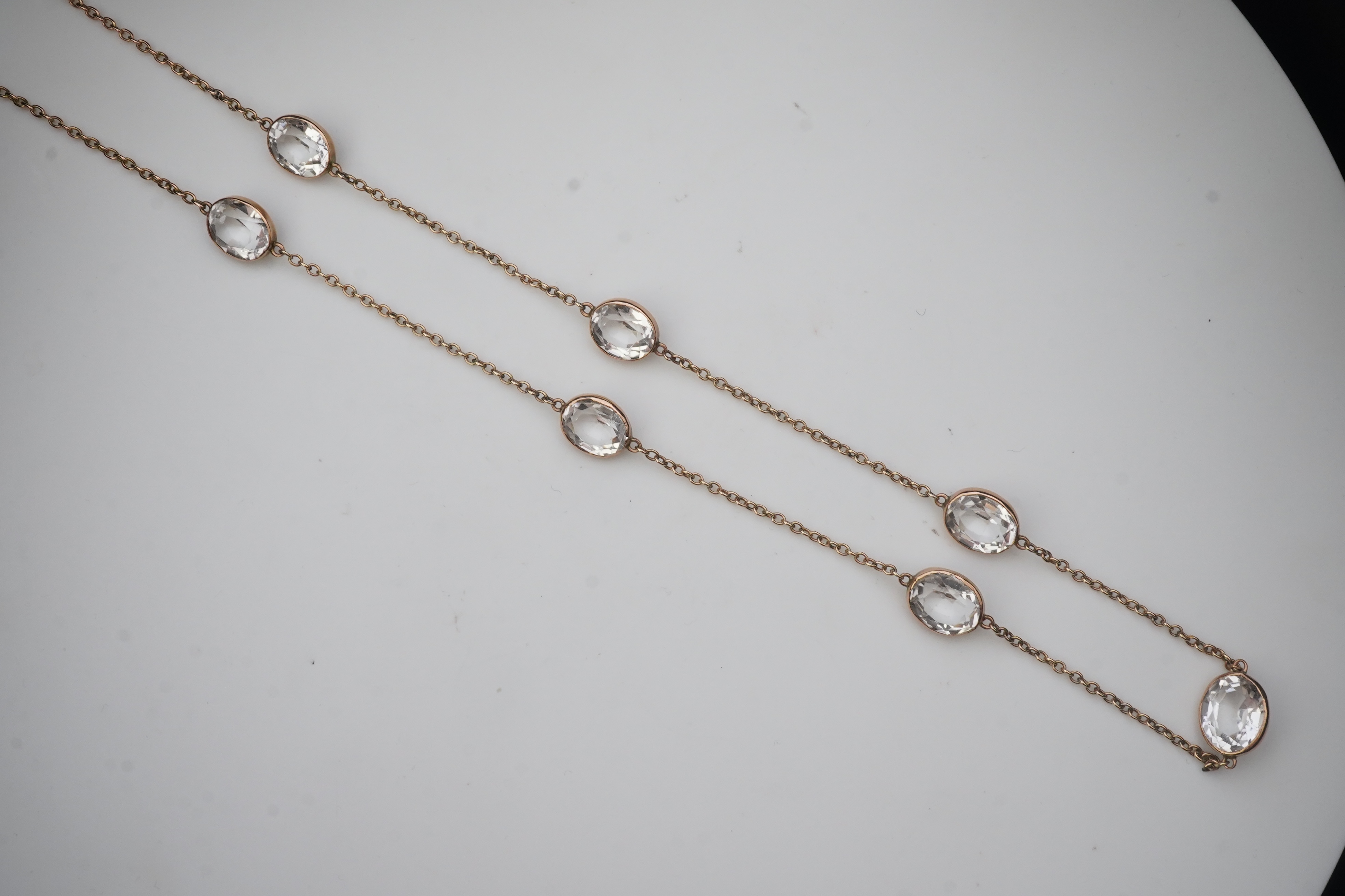 A rock crystal long chain necklace, early 20th century